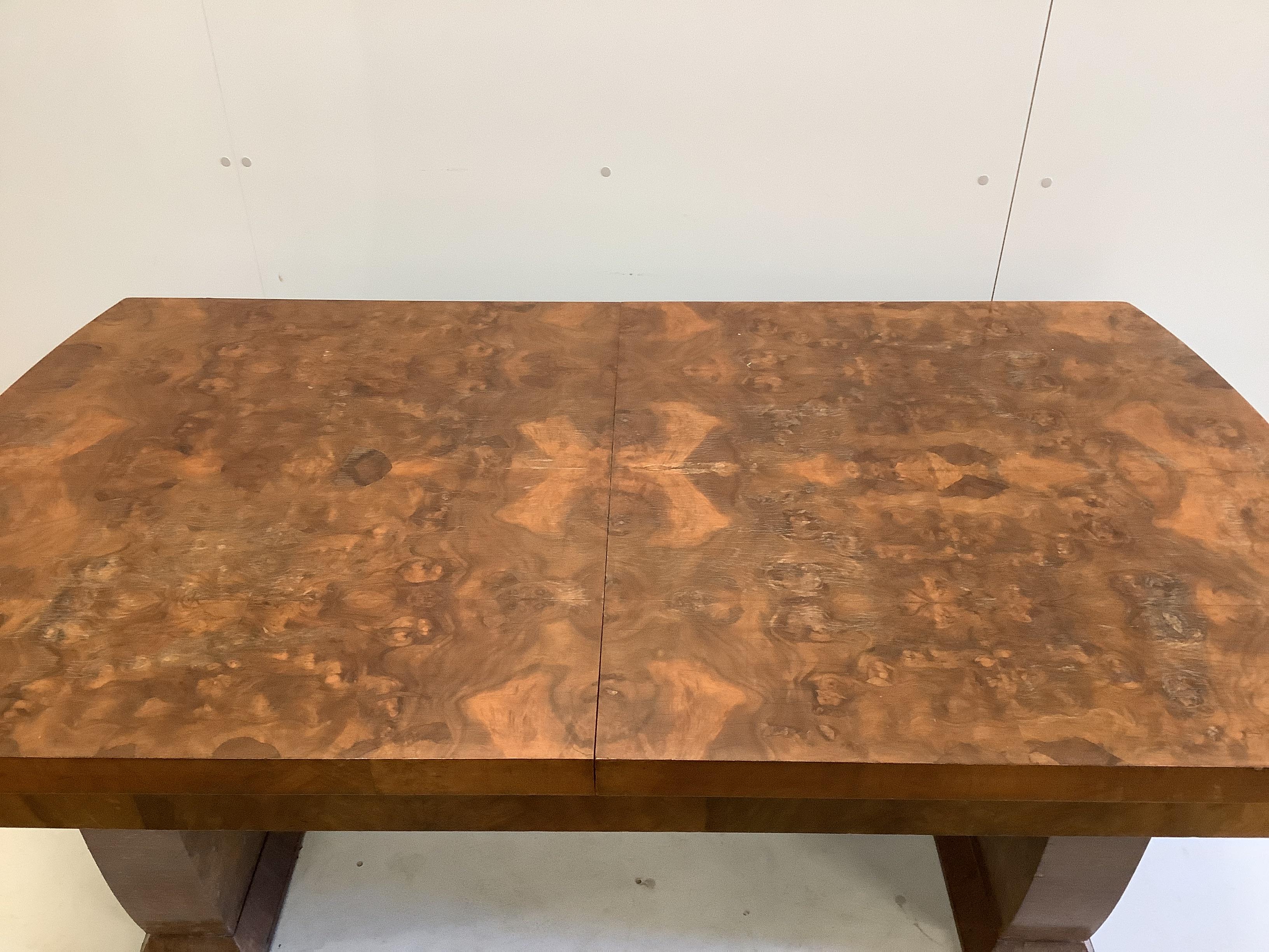 An Art Deco style walnut extending dining table, width 170cm, depth 92cm, height 73cm
